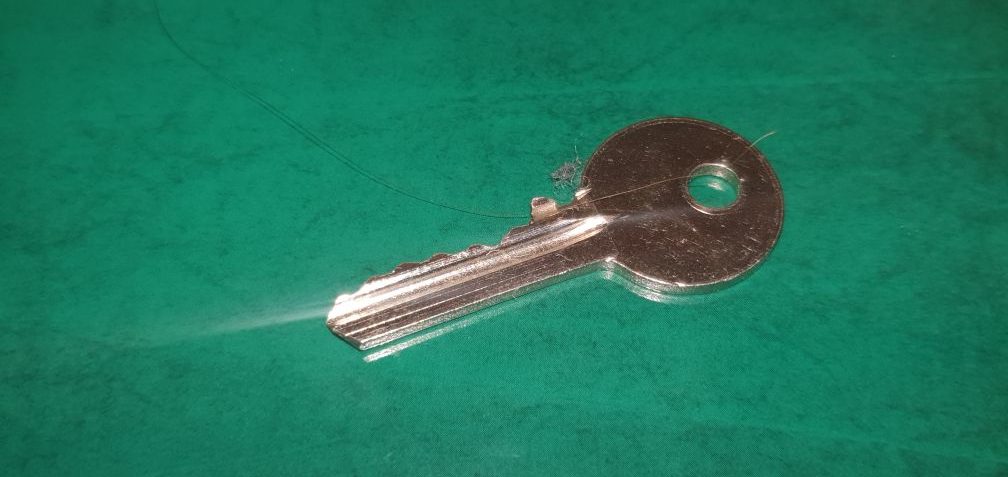 key on green background